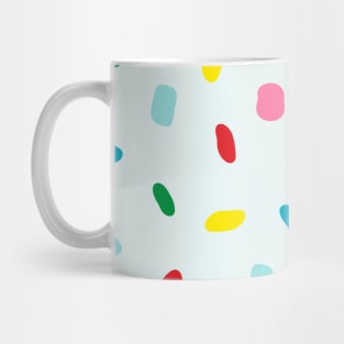 Colorful sprinkles on blue melting icing Mug